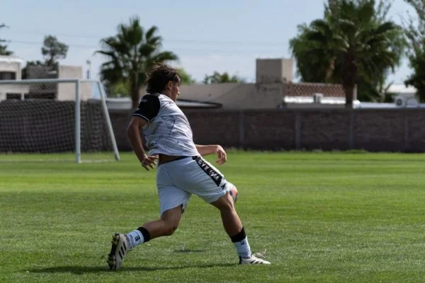 soccer striker shooting